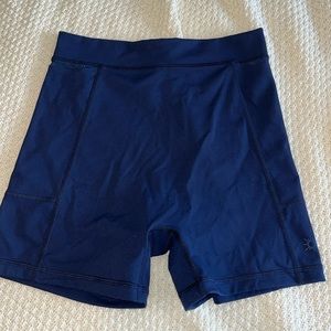 Navy blue Offline by aerie bike shorts with pockets.